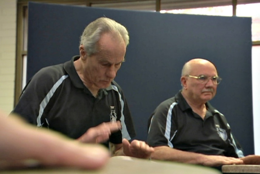 Veterans participate in group drumming session for PTSD