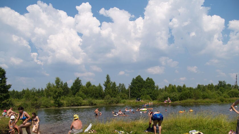 Many Russians spend the brief summer taking dips in ponds and rivers