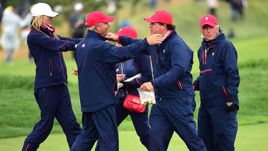 Phil Mickelson celebrates Presidents Cup win