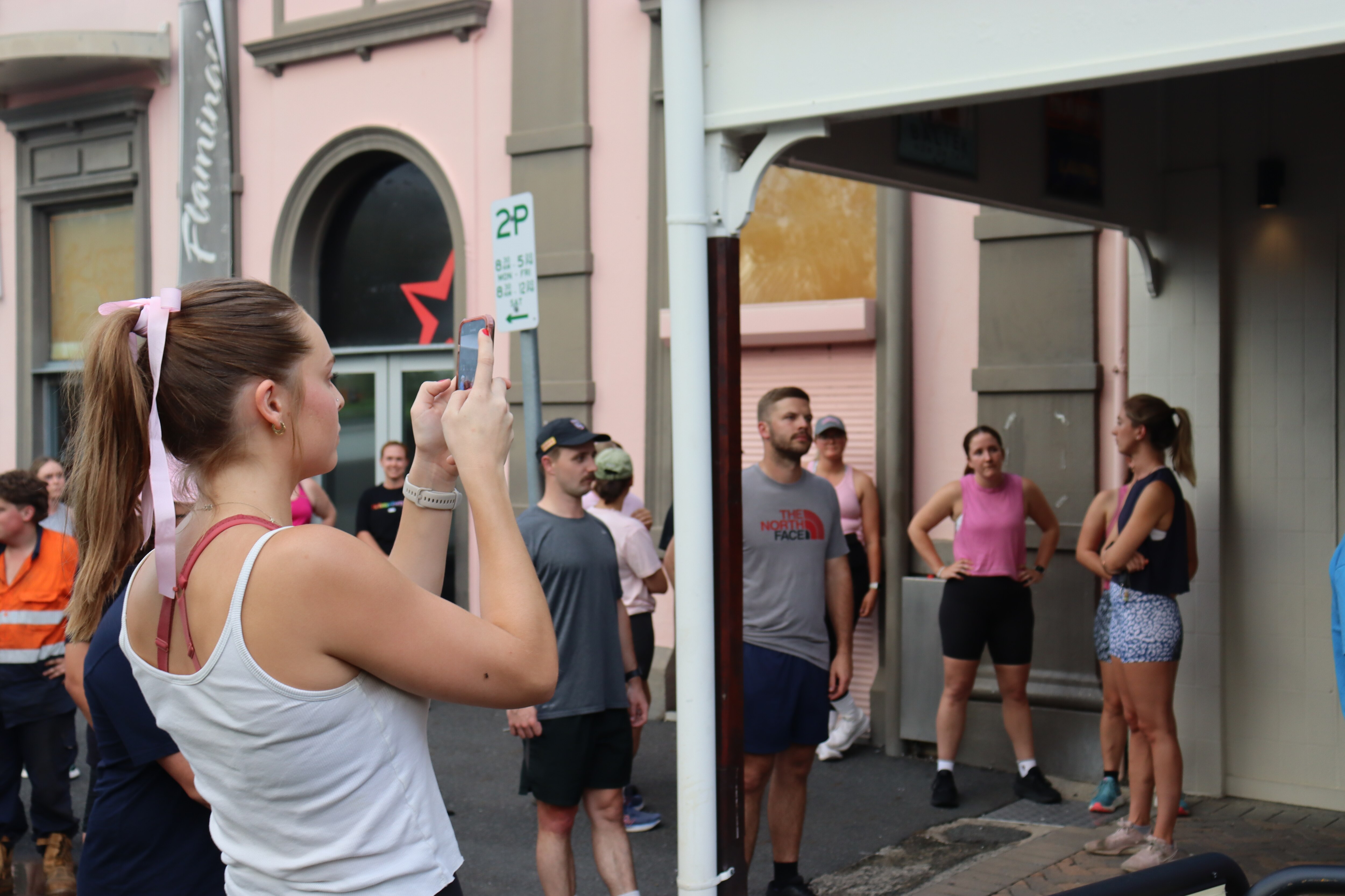 Woman takes video with phone
