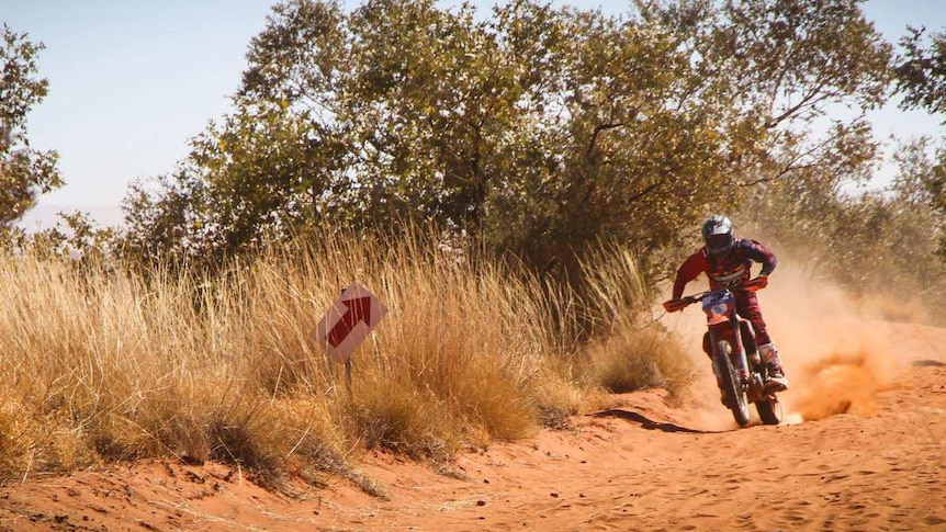 A man participates in Finke Desert Race.