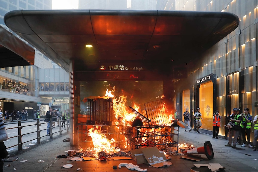 A fire burns at the entrance of central station in Hong Kong.
