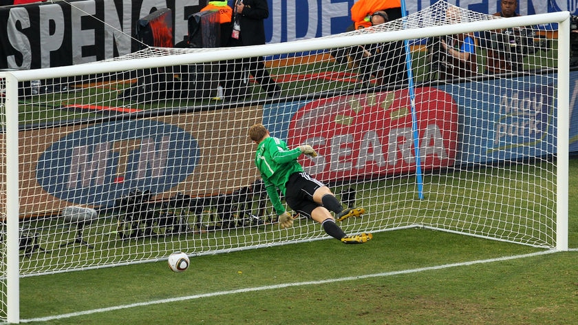 Germany's Manuel Neuer watches Frank Lampard's shot go over the line, but the goal was not allowed.