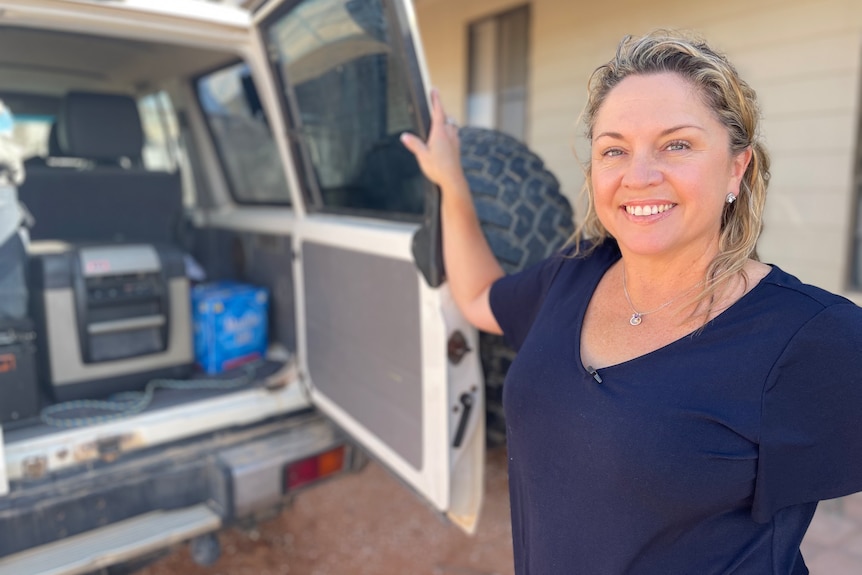 Simone Bertram from Port Lincoln stands next to her vehicle