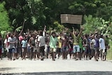 Solomon Islanders take to the streets to protest.