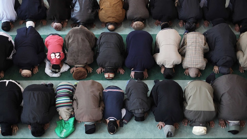 British Muslims praying