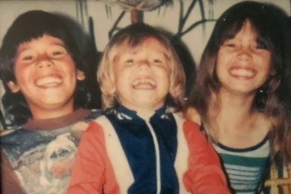 Three smiling children