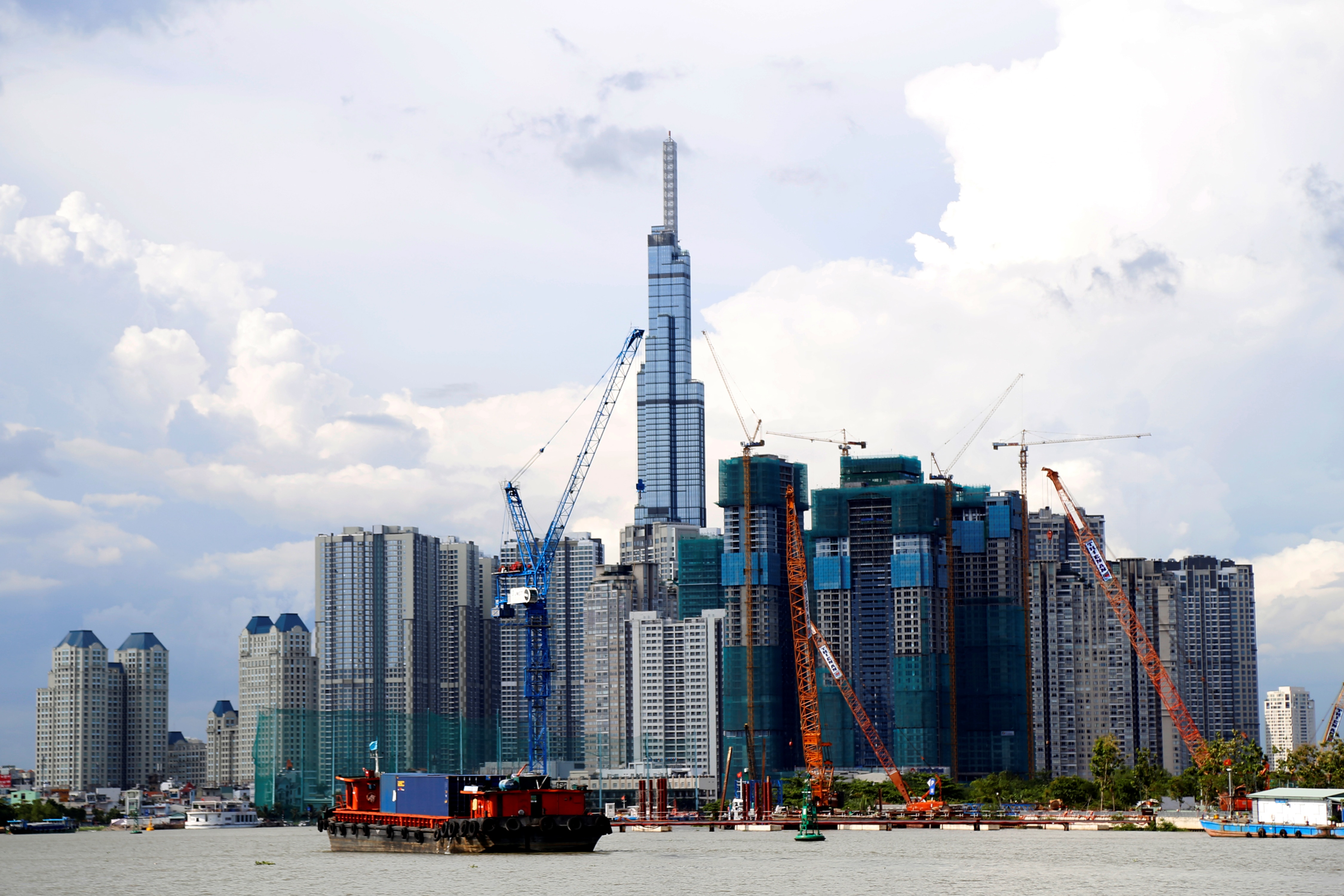 Vietnam's tallest buildings are seen from the Saigon river in Ho Chi Minh city.