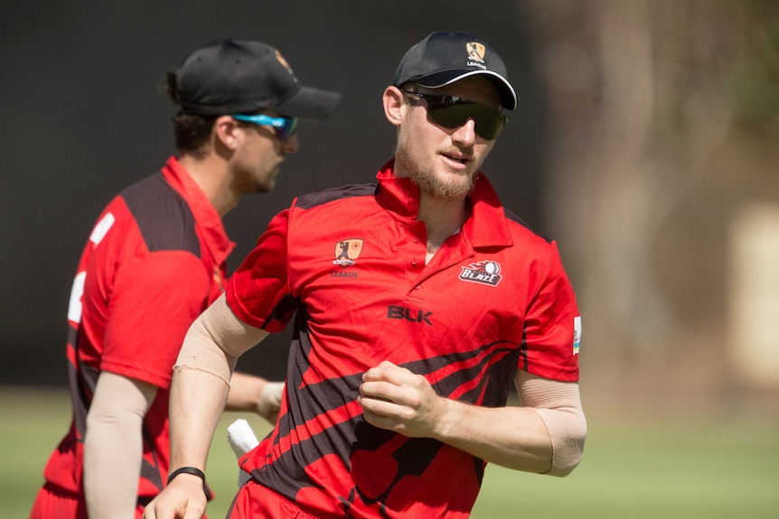 Cameron Bancroft jogs after making a catch