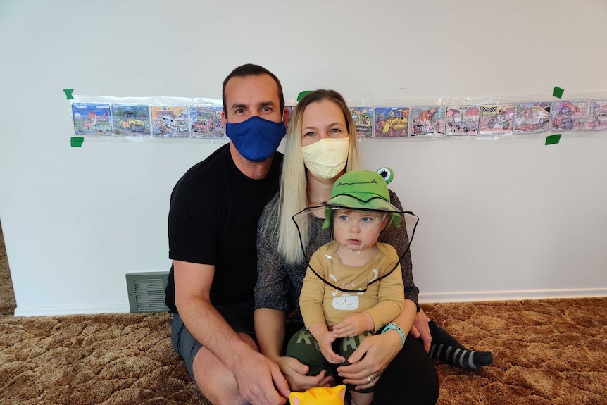 The Jeffries family wearing masks.