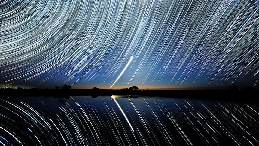 Star trails over Lake Tyrrell in the Mallee district of north-west Victoria with Chargee Gnowee (Venus) low on the horizon.