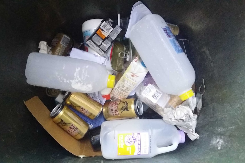 The inside of a recycling bin.