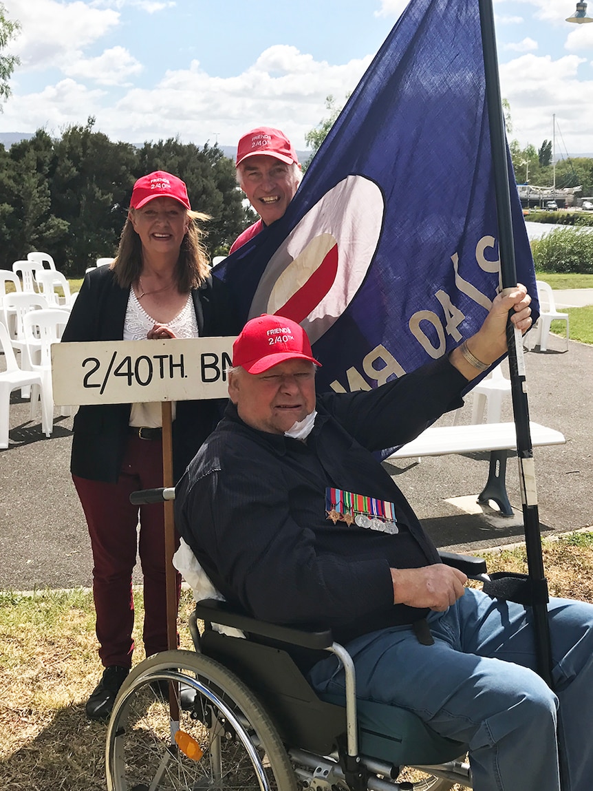 Karen Cassidy, Rod Stone and Chris Cassidy (seated) at 75th anniversary of 2/40th Australian Infantry Battalion capture.