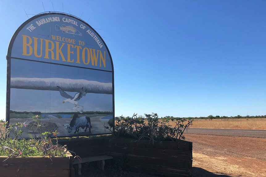 Welcome to Burketown sign on the side of a road