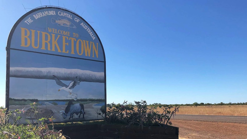 Welcome to Burketown sign on the side of a road