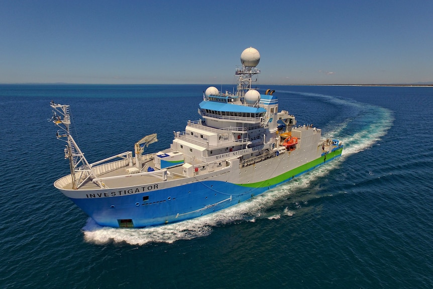 A large research vessel on the ocean.