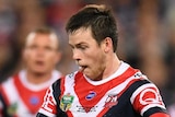 Luke Keary about to kick the ball on his right foot for the Sydney Roosters in the 2018 NRL grand final.