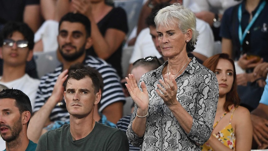 Judy Murray stands next to Jamie Murray in Andy Murray's player's box during an Australian Open match.
