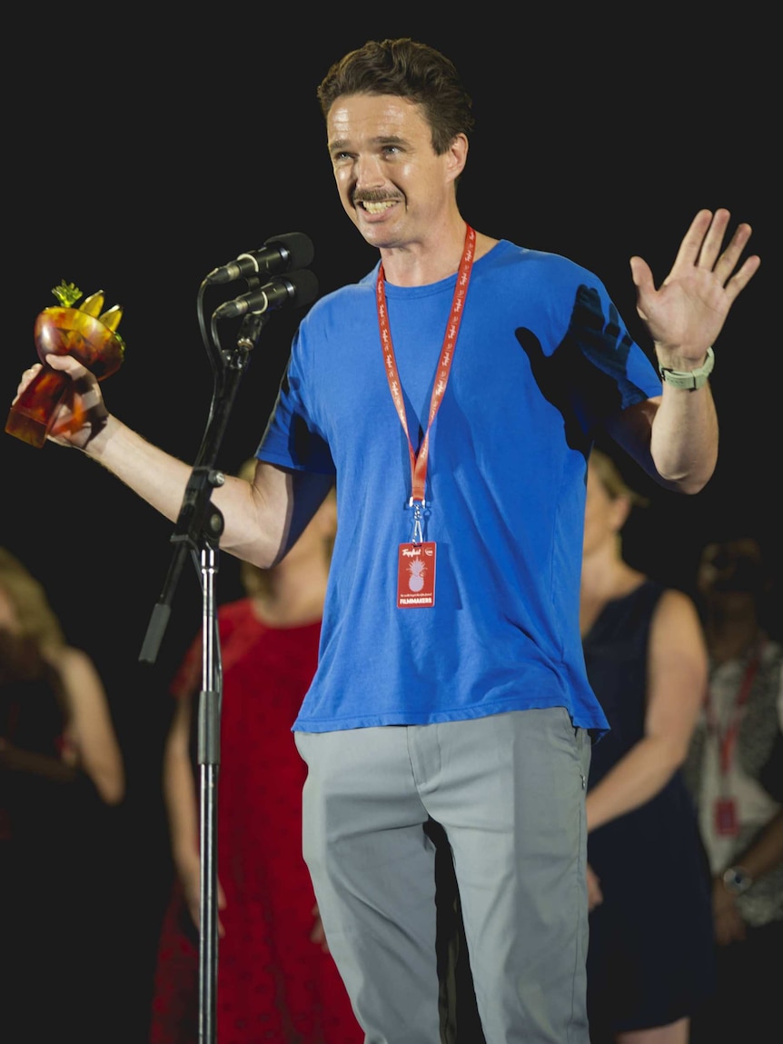 Matt Day accepts his award at Tropfest short film festival