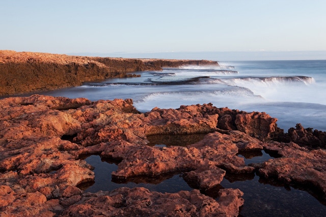 A wide shot of steep cliffs and rocks at High Rock near Carnarvon in WA's Mid West.