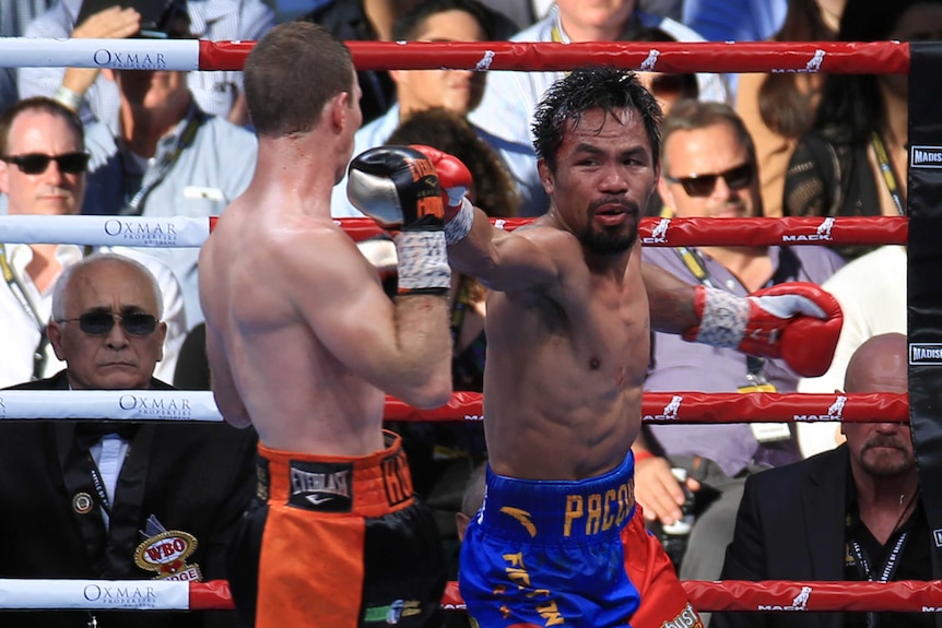 Manny Pacquiao swings at Jeff  Horn