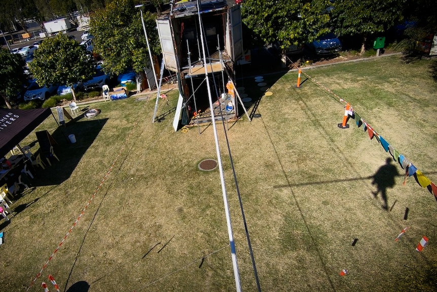 A view of the grassy ground from a tighrope