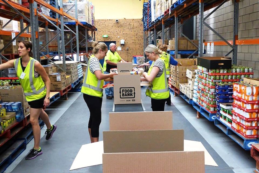 Hampers are packed inside a Foodbank warehouse.