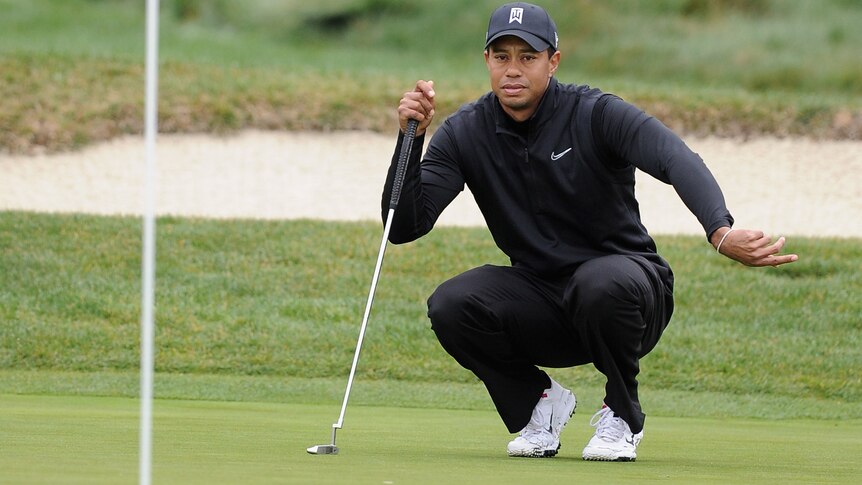 Crouching Tiger ... Woods is four shots off the lead with only two others in front of him.