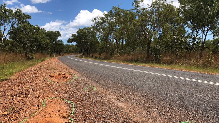 Green markings on the road where Major Crash Investigators examined the site of a fatal accident