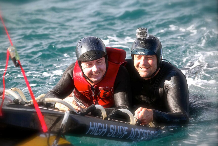 Close up of Paul D'Vorak (l) and Richard Horner (r) in the water in WA