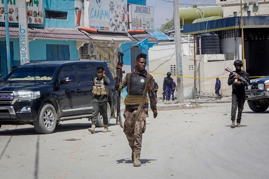 Somalian security forces patrol the streets of Mogadishu.