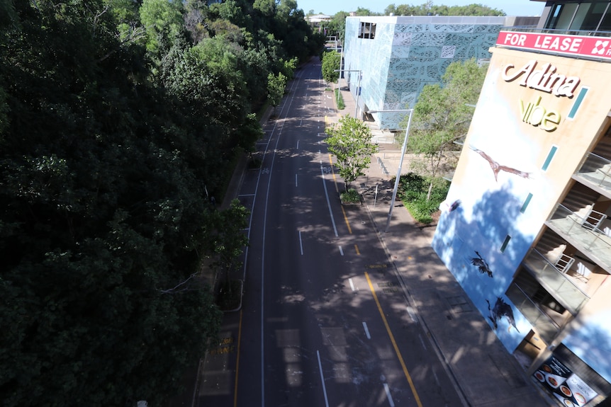 An empty street with the Adina vibe hotel.