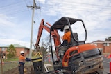 Trench being dug in a Tasmanian street for the national broadband network optic fibre