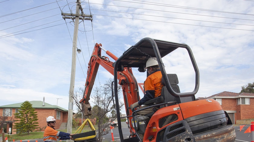 Trench being dug in a Tasmanian street for the national broadband network optic fibre