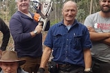 War veterans from Team Rubicon Australia completing community work with chainsaws
