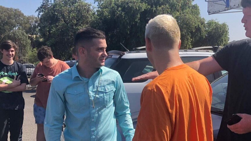 Michael Philippou with identical twin Danny outside the Christies Beach Magistrates Court.