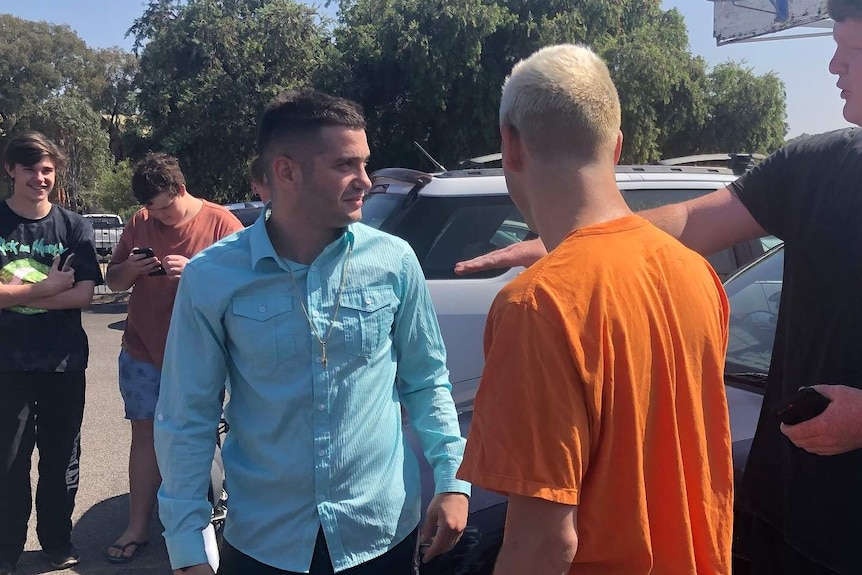 Michael Philippou with identical twin Danny outside the Christies Beach Magistrates Court.