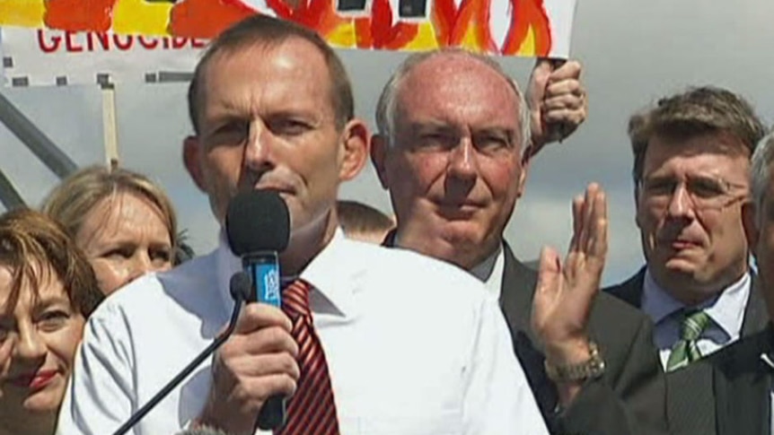 Opposition Leader Tony Abbott speaks at a carbon tax at a rally in Canberra. (ABC TV)