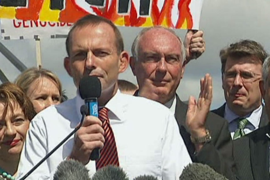 Opposition Leader Tony Abbott speaks at a carbon tax at a rally in Canberra. (ABC TV)