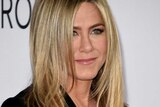 Axctor Jennifer Aniston poses for a photo.