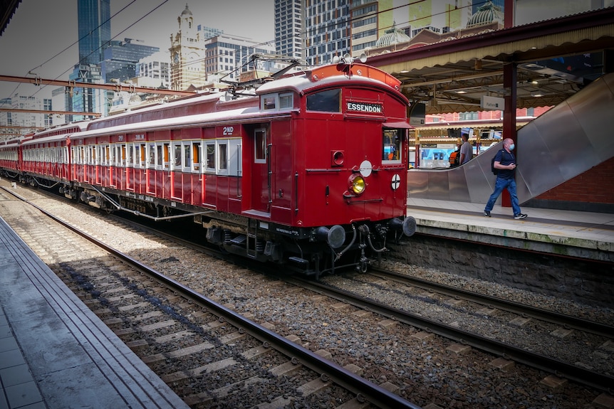 A restored Red Rattler train sits at Flinders Street Station 