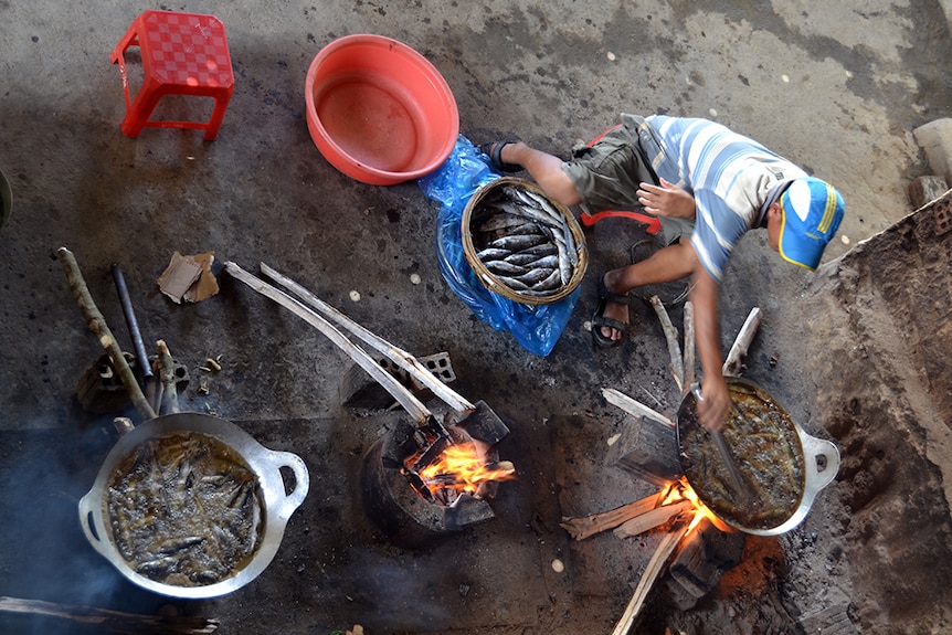 Lunch being prepared in the orphanage's makeshift kitchen area