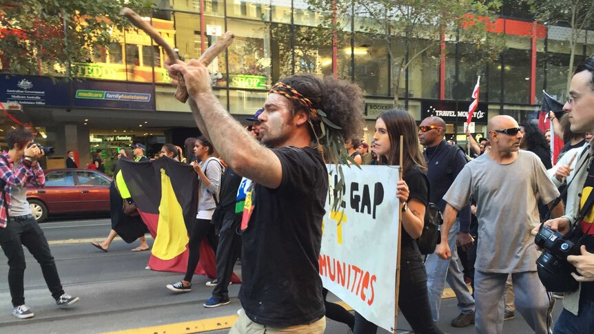 Marching protesters in Melbourne's CBD