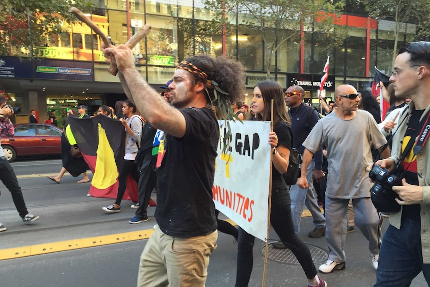 Marching protesters in Melbourne's CBD