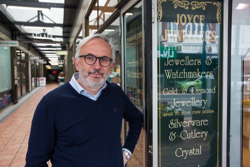 Burnie Mayor Steve Kons outside the jewellery store