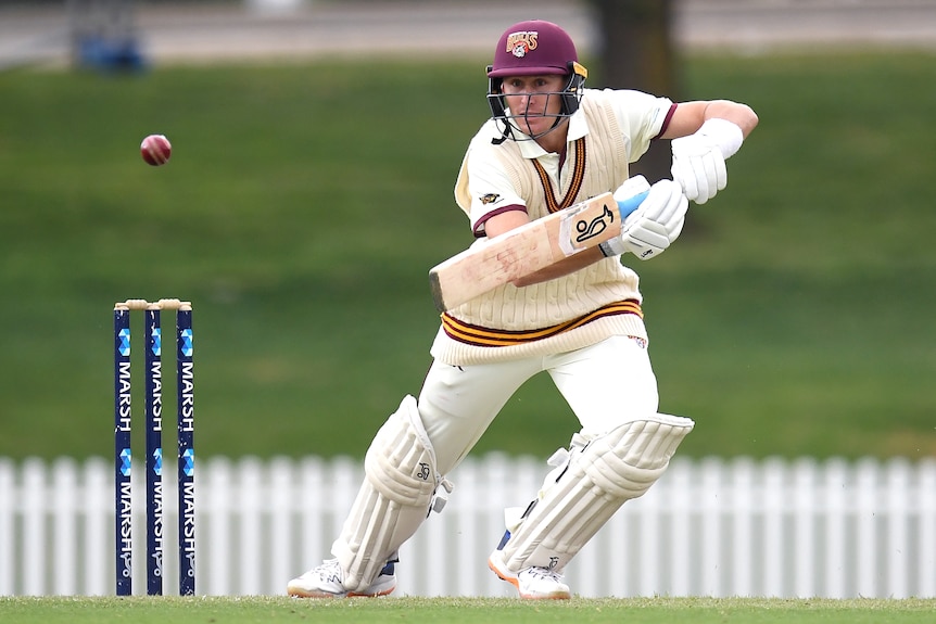 Cricket player making a run after hitting the ball during a game