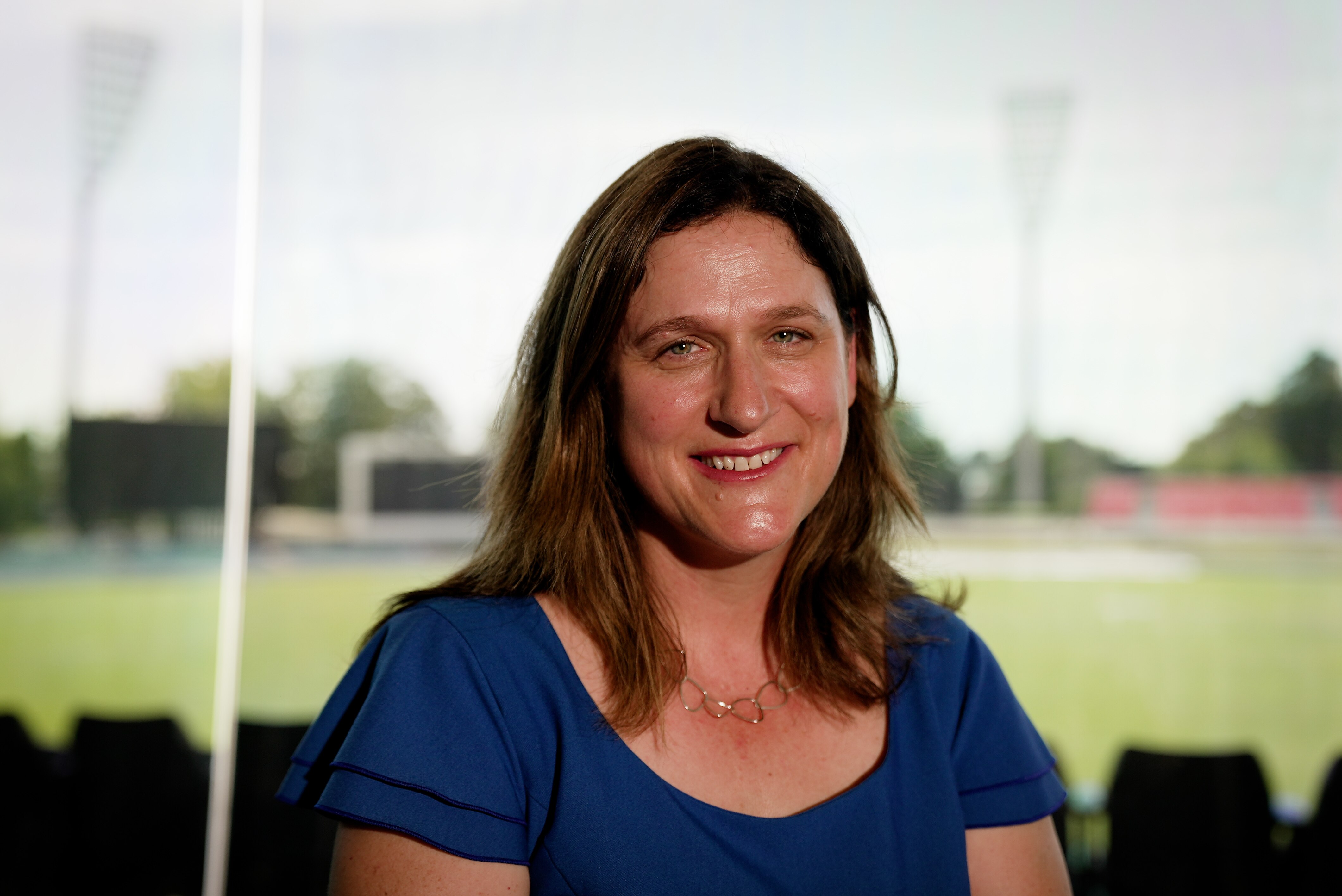 Women in cricket gear train at Manuka oval
