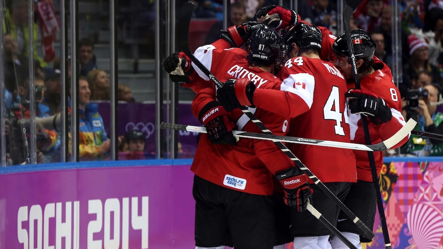 Canada romps to men's ice hockey gold