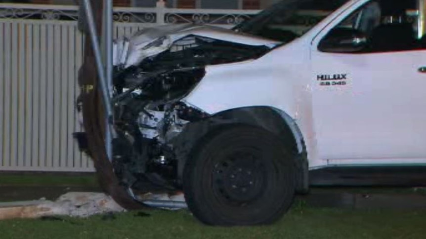 Damage to the front of a ute which crashed into a power pole