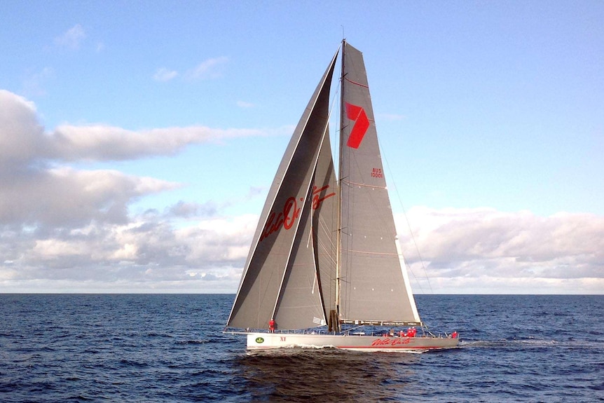 Sydney to Hobart yacht, Wild Oats XI, races down the coast of south east Australia.